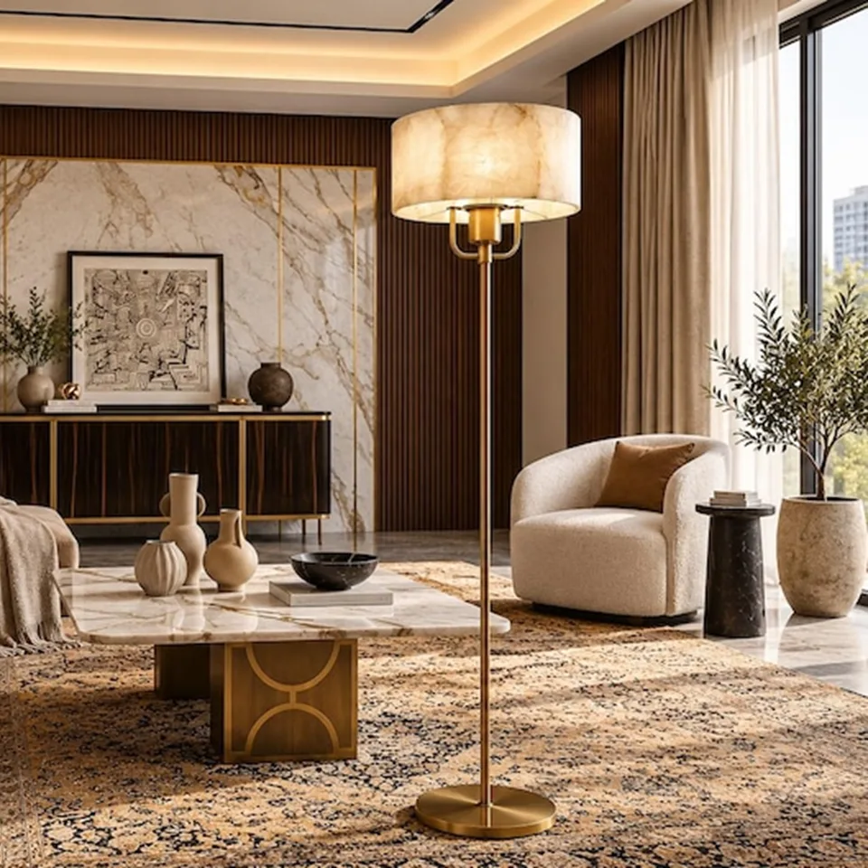 Alabaster Floor Lamp with Shade – Stone Drum, Brass Finish, 152 cm 2 Alabaster floor lamp with shade beside a marble coffee table and boucle armchair