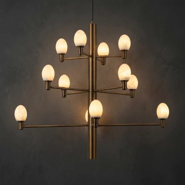 Alabaster egg chandelier glowing warm on a dark wall