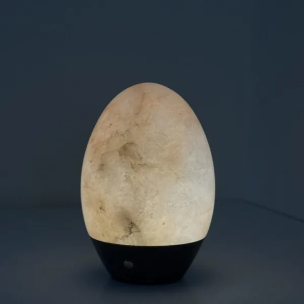 Alabaster egg lamp showing natural cloudy veining in the stone