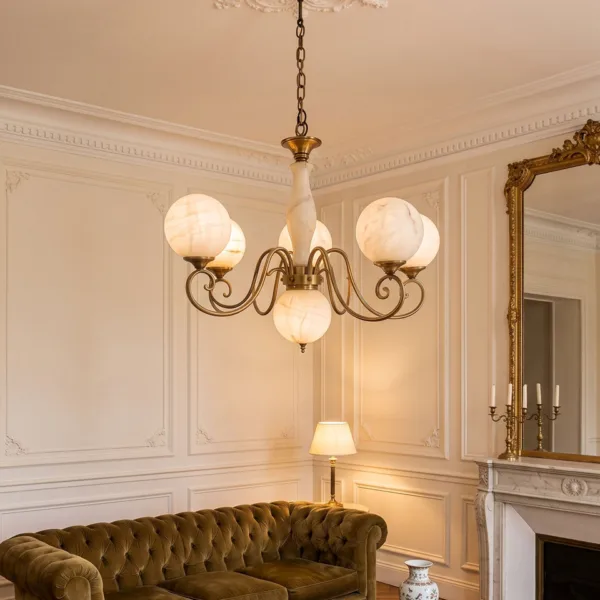 Alabaster globe chandelier in a classic living room with a velvet sofa