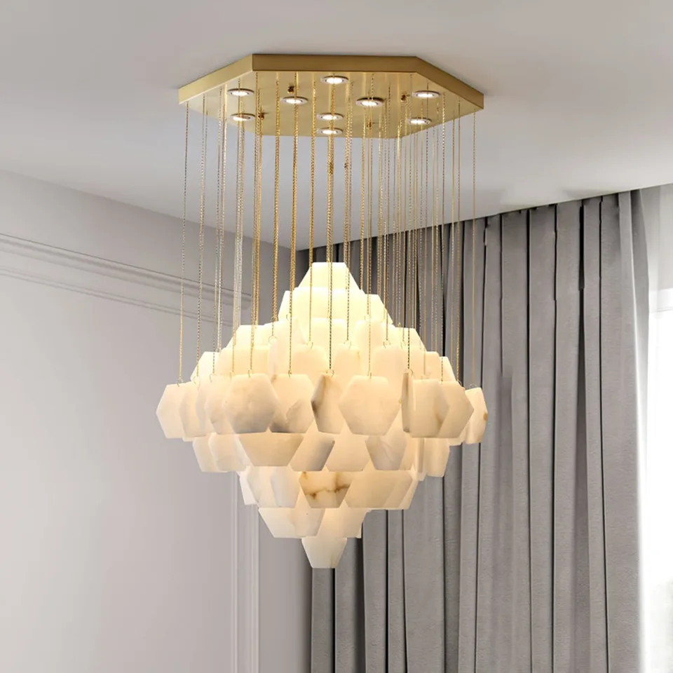 Alabaster Hexagon Chandelier 6 Round alabaster hexagon chandelier lit in a room with curtains