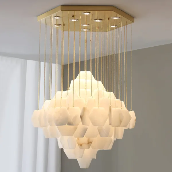 Round alabaster hexagon chandelier lit, LED lights in the brass ceiling plate