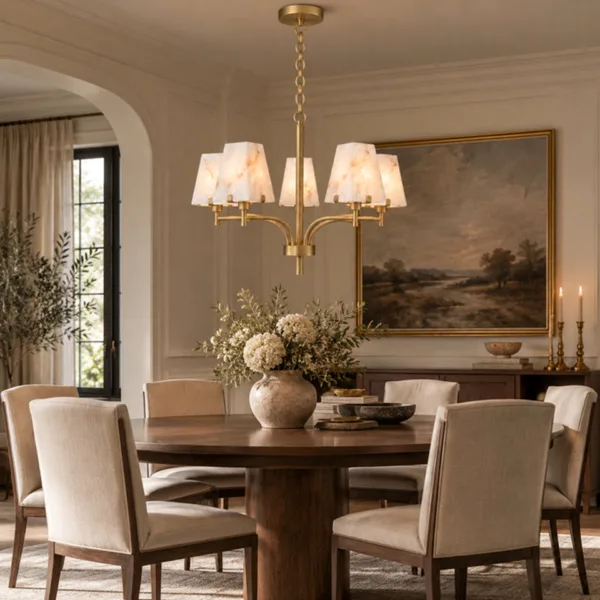 Alabaster shade chandelier over a round wooden dining table