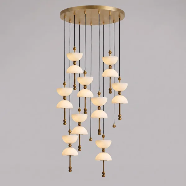Alabaster staircase chandelier with 12 pendants on a round brass canopy, unlit, on a grey background