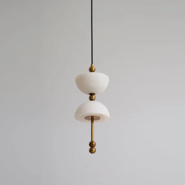 Single unlit alabaster pendant from the alabaster staircase chandelier showing cream stone