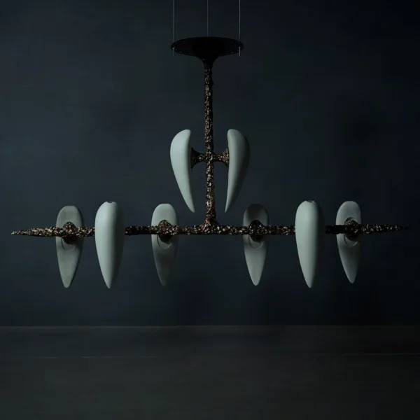 Alabaster teardrop chandelier with eight white alabaster drops on a dark cast-metal frame, unlit against a dark navy backdrop