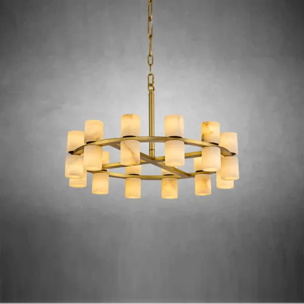 Round alabaster tube chandelier lit, warm glow through the stone