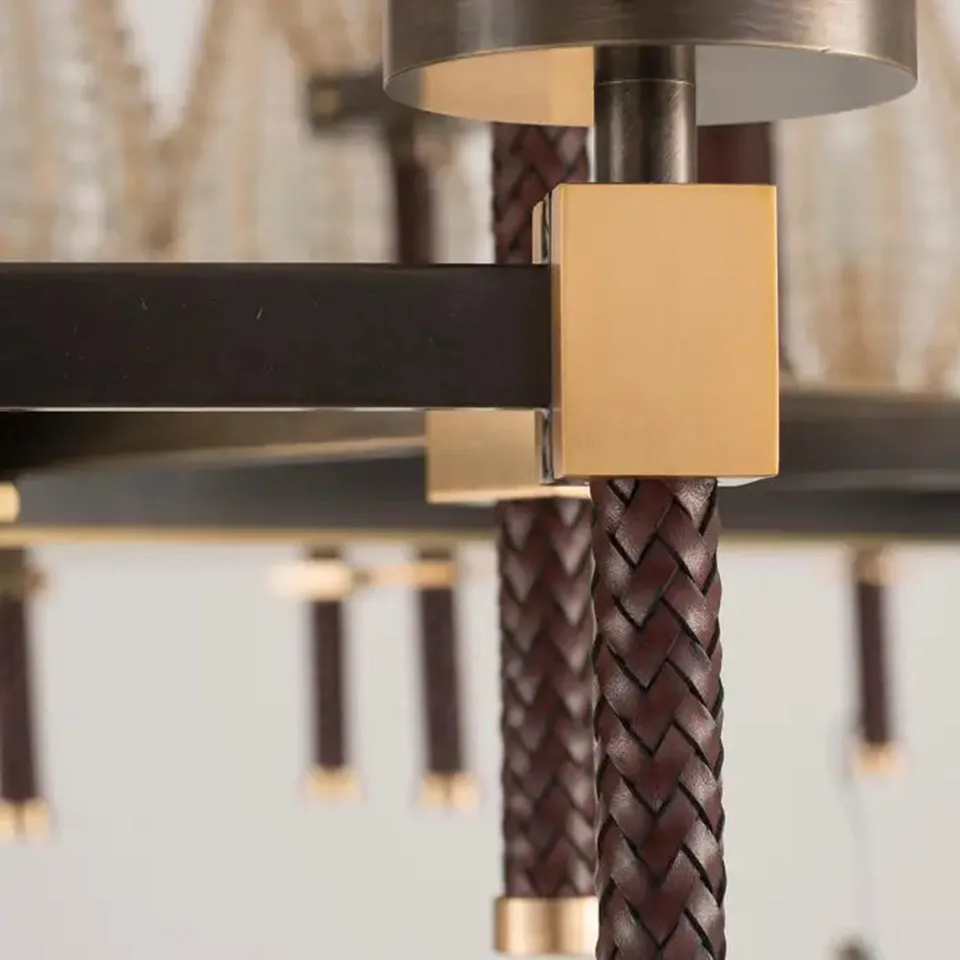 Beaded Rectangular Chandelier 12 Braided brown cord on a post with a brushed brass block, close-up