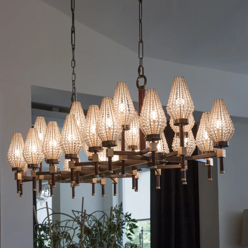Beaded Rectangular Chandelier 6 Beaded rectangular chandelier lit in an interior with large windows