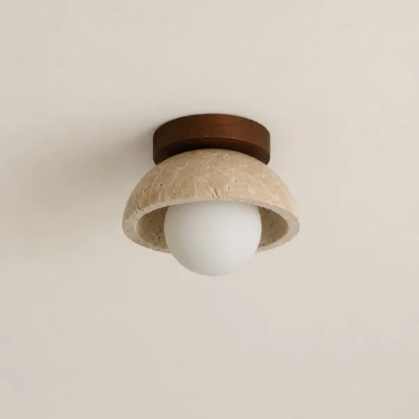 Ceiling light for passage: a travertine bowl on a round wood canopy with a white opal glass globe