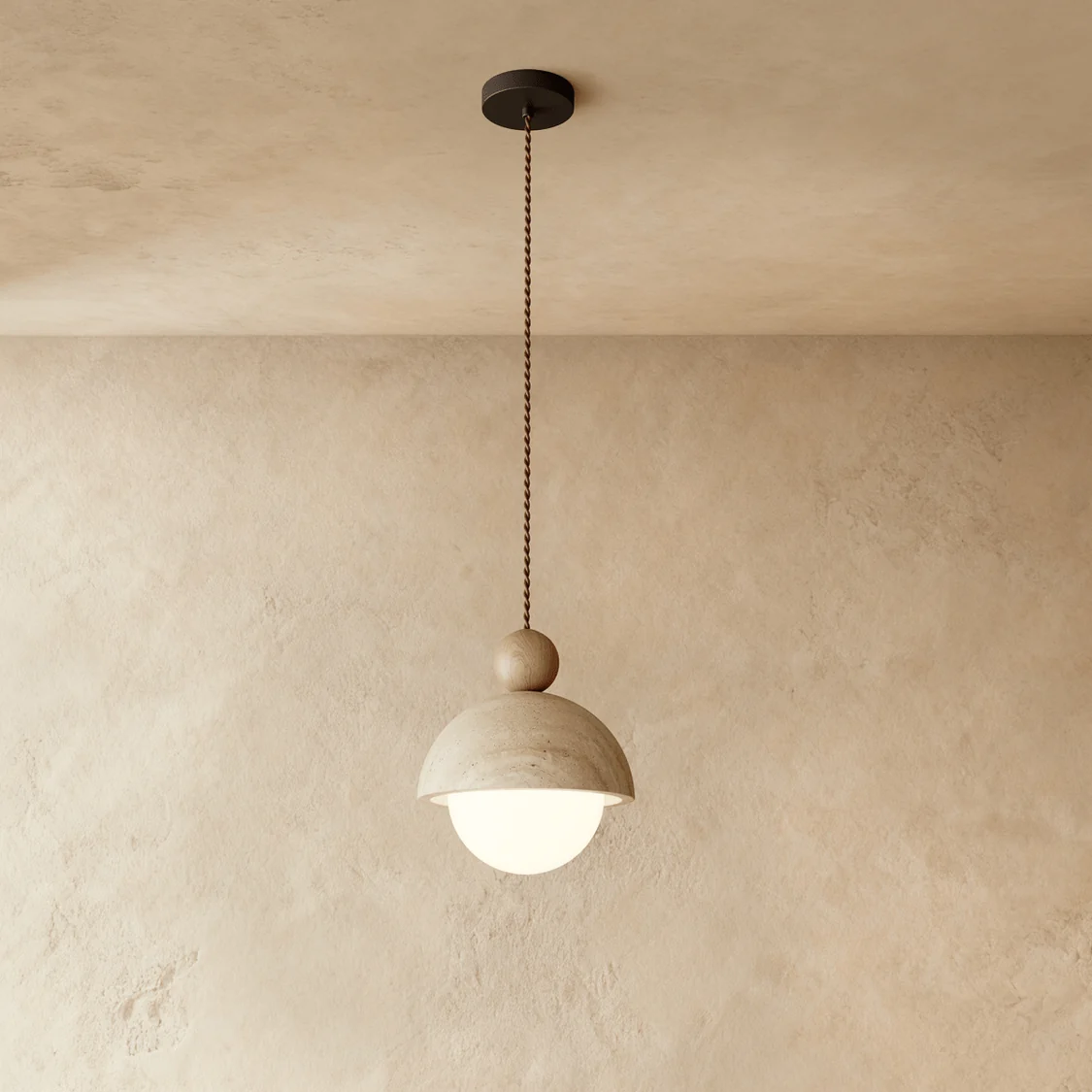 Ceramic dome pendant light with a wooden ball cap and glowing opal globe, hanging against a plaster wall