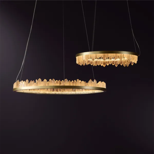 Two quartz crystal ring chandeliers hung together, glowing warm gold