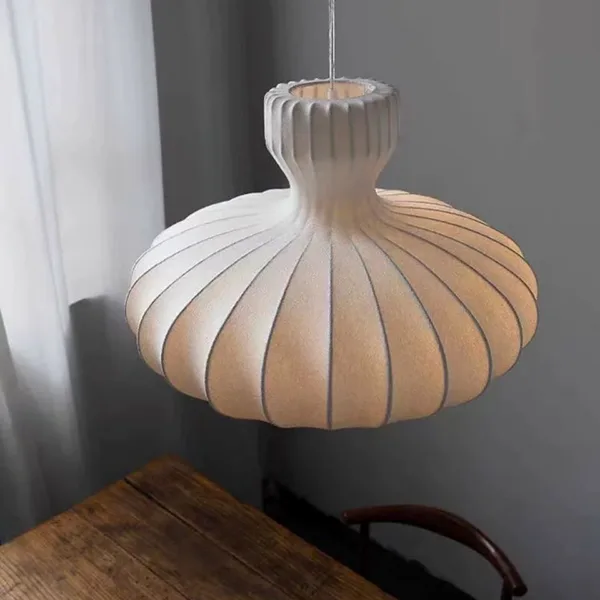 Cocoon pendant light seen close up, showing the ribbed onion-dome form and flared neck