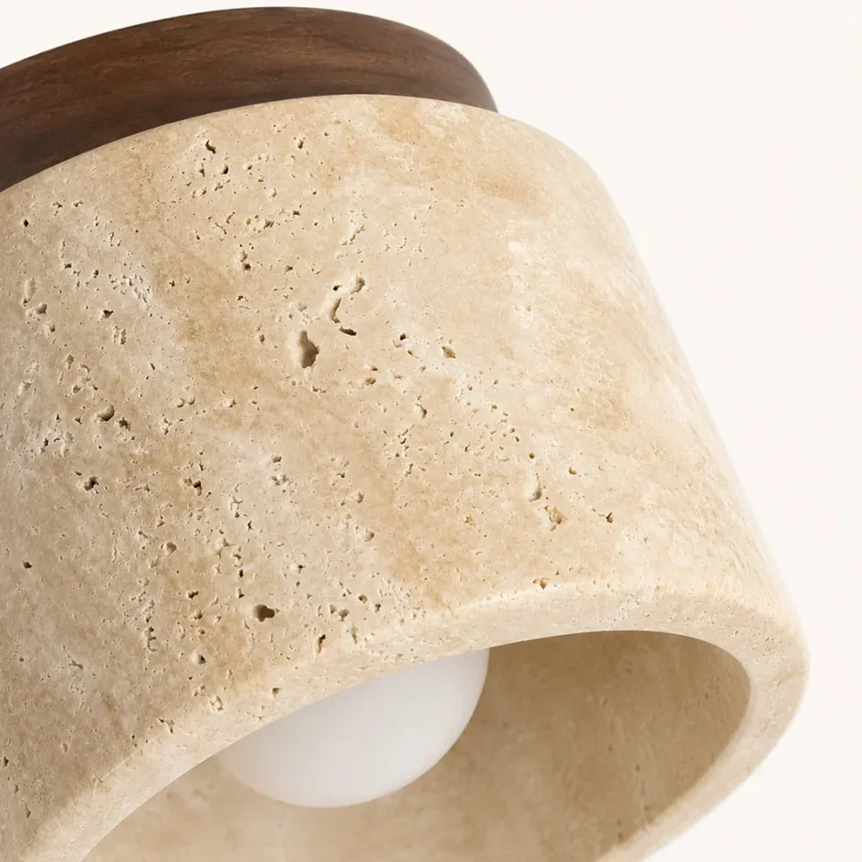 Cylindrical Ceiling Light – Travertine Drum, Wood Canopy, G9, 12 cm 7 Close-up of the honed travertine drum with its natural pits below the round wood canopy