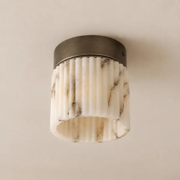 Unlit alabaster fluted light with grey and honey veins under an antique bronze-finish canopy