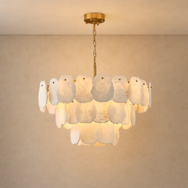 Round chandelier for living room with three layers of raw alabaster slabs, brass chain and canopy, lit