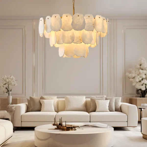 Layered alabaster chandelier above a living room sofa