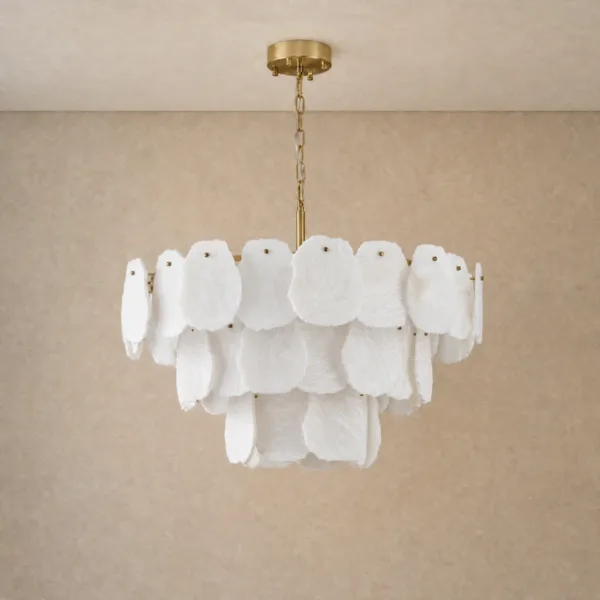 Layered alabaster chandelier unlit, white raw-edged stone slabs