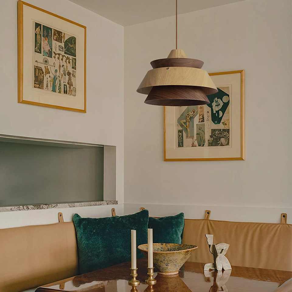 Layered Wood Pendant Light – Two-Tone Walnut & Oak, 33 cm 4 Layered wood pendant light over a banquette dining nook with framed prints