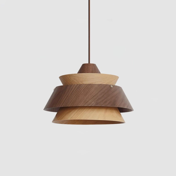 Layered wood pendant light with alternating oak and walnut tiers on a grey background