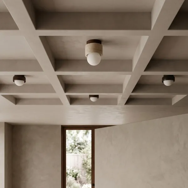 Mini travertine ceiling lights in a coffered ceiling