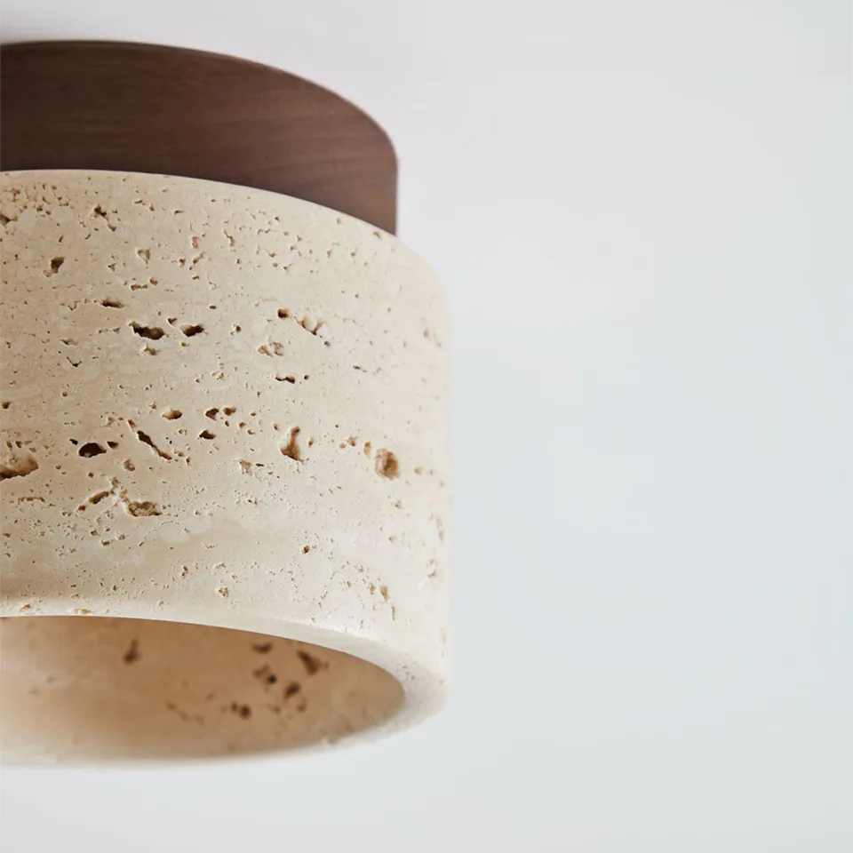 Travertine Ceiling Light – Mini Flush Mount with Opal Globe, 12 cm 5 Close-up of the honed travertine ring and its natural pits