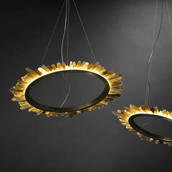 Crystal ring chandelier with crystal points fanning out from the outside edge, lit