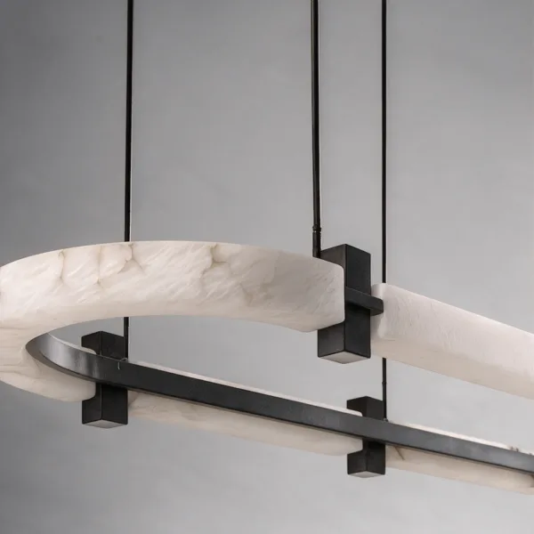 Close-up of veined natural alabaster and the inner metal rail