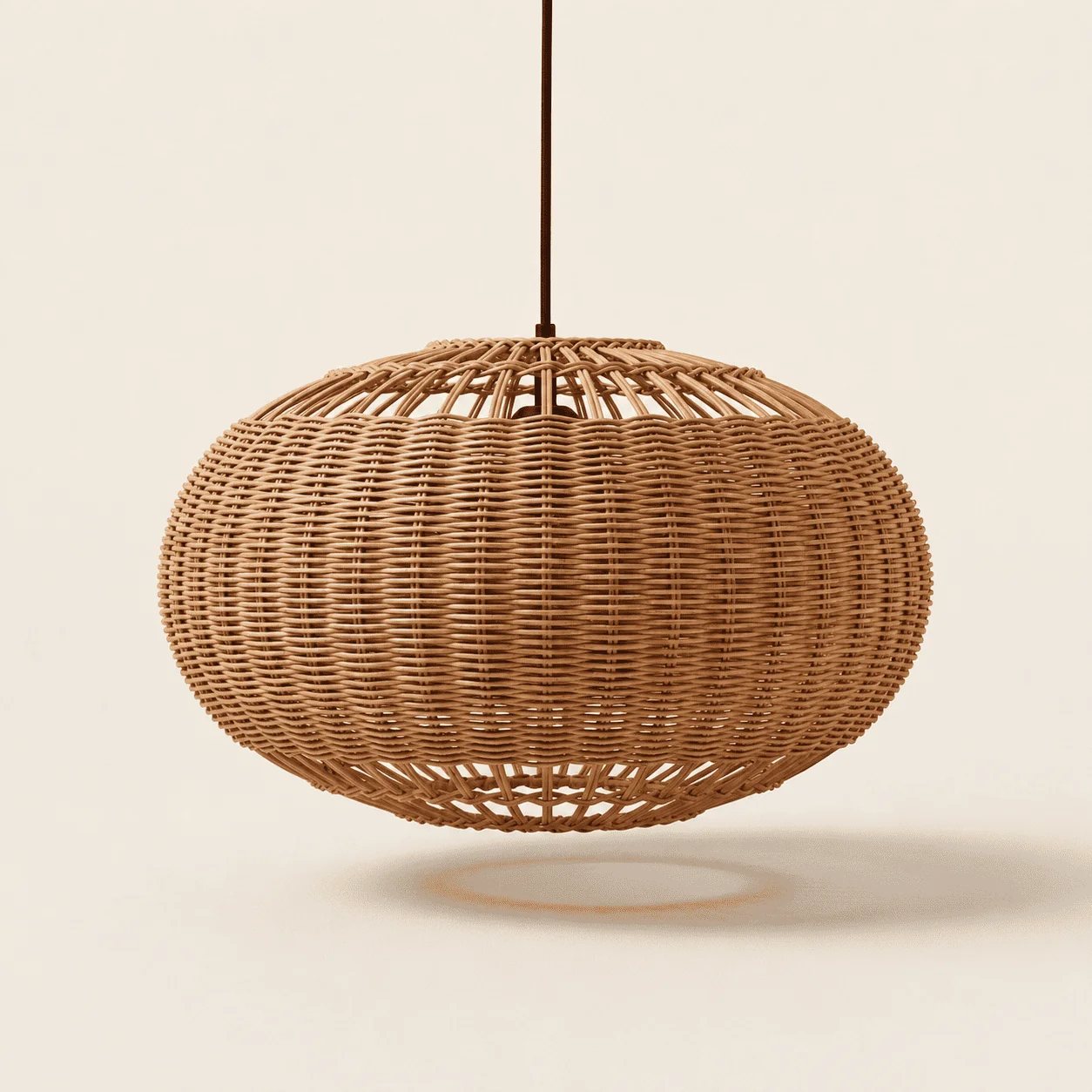 Handwoven natural rattan globe pendant light with open radial rods at the top and bottom