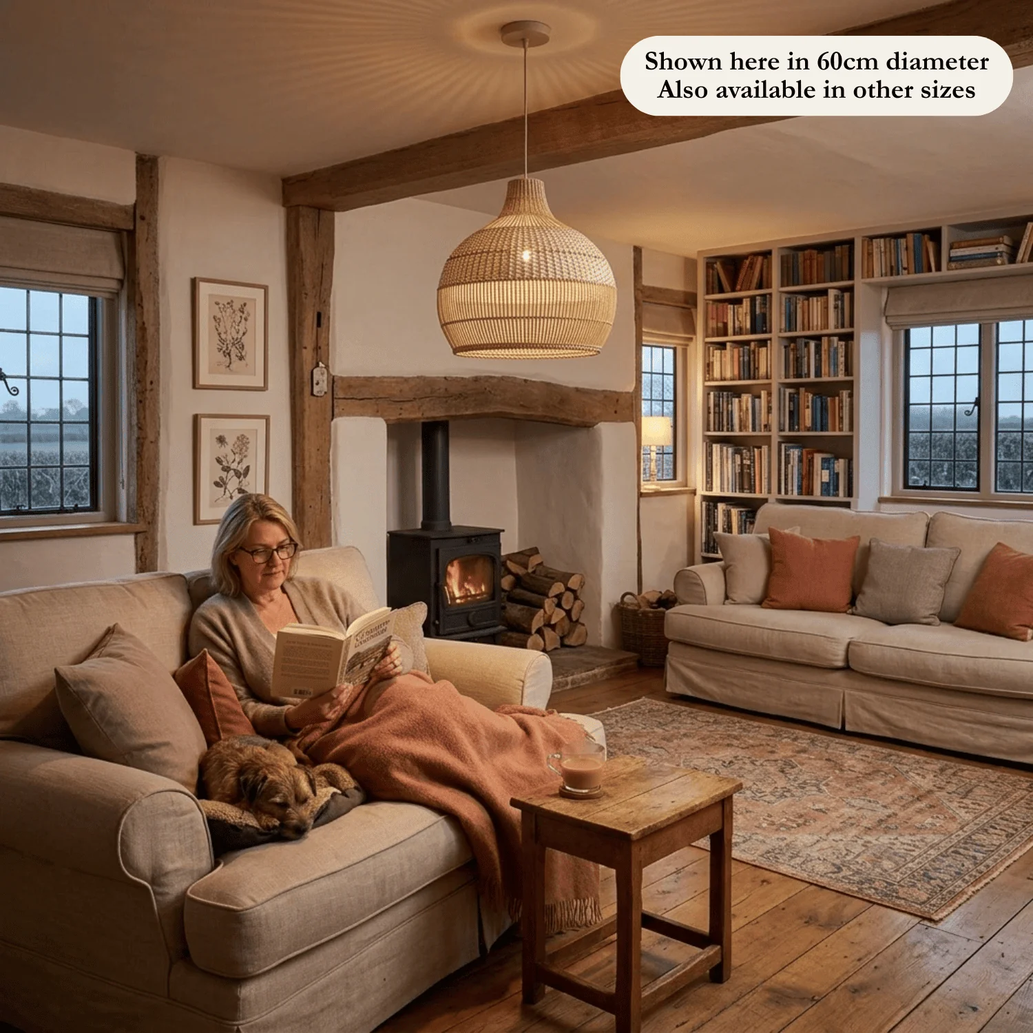 Rattan Hanging Lamp – Handwoven Pendant, Coastal or Natural, 35–60 cm 5 60 cm natural rattan hanging lamp lighting a living room with sofas, bookshelves and a wood stove