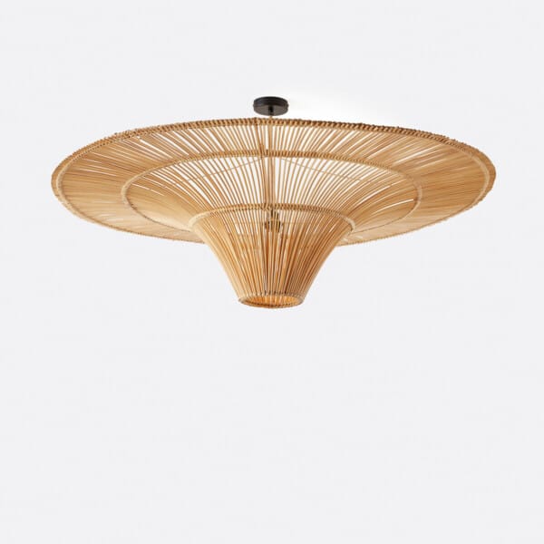 Rattan pendant lamp on a short drop from a matte black ceiling canopy, seen from below