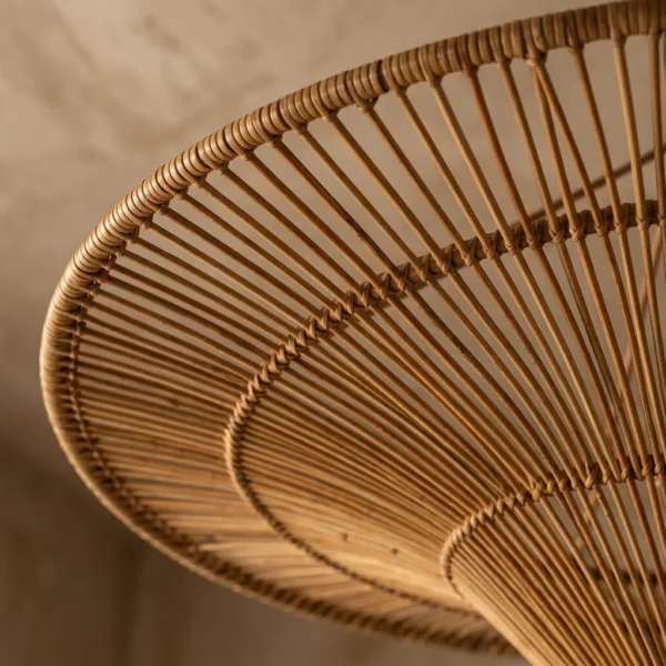 Close-up of the hand-bound rings and natural rattan rods of the rattan pendant lamp