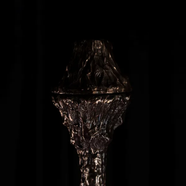 Textured metal canopy of the sculptural chandelier, close-up