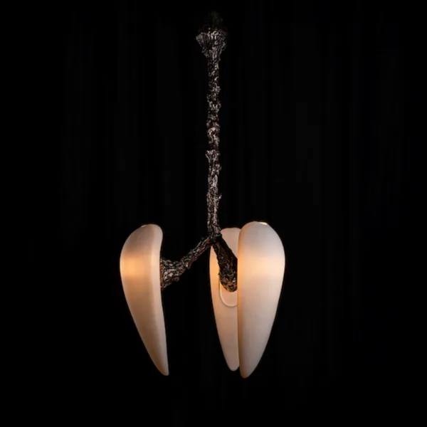 Full height of the sculptural alabaster chandelier, textured stem and three drops, lit