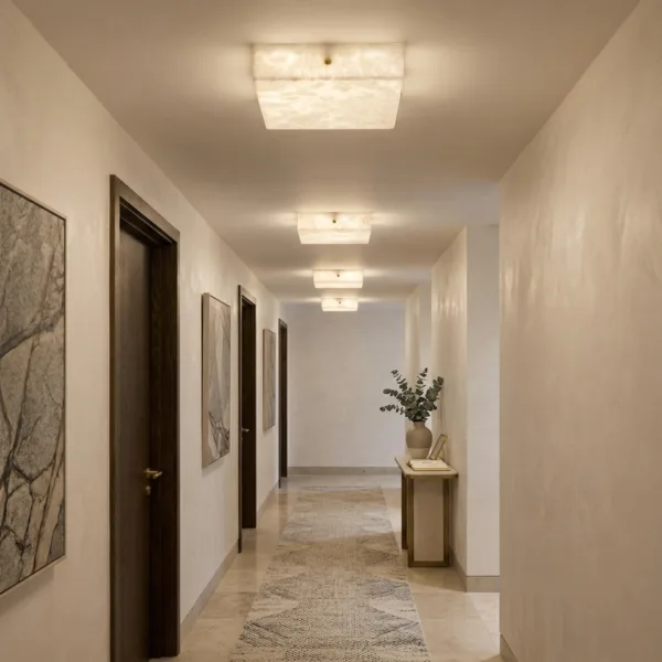 Row of square alabaster ceiling lights along a corridor