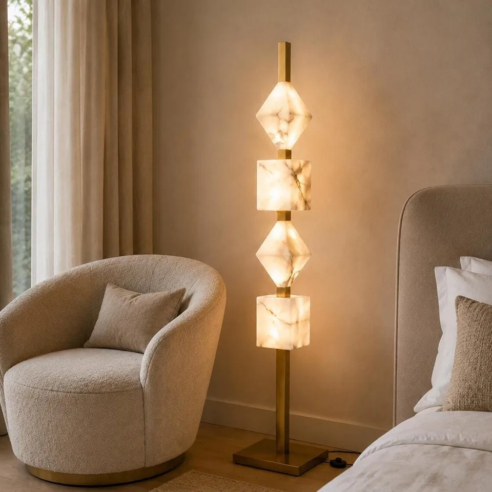 Designer Floor Lamp – Stacked Alabaster Column, Built-in Warm LED, 152 cm 4 Stacked alabaster floor lamp in a bedroom beside a boucle chair and bed