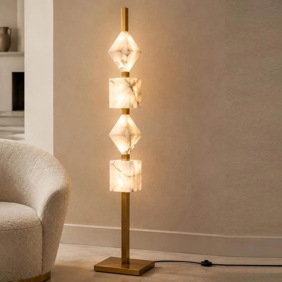 Designer Floor Lamp – Stacked Alabaster Column, Built-in Warm LED, 152 cm 3 Alabaster floor lamp glowing beside a cream boucle armchair