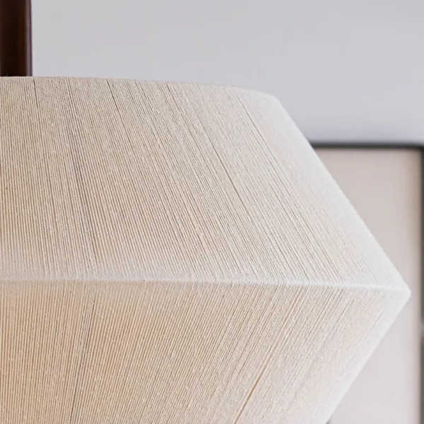 Close-up of the wound cream thread texture on the diamond pendant light shade