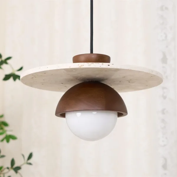 Travertine dome pendant light close-up: walnut-tone wood dome with visible grain over an opal borosilicate glass globe