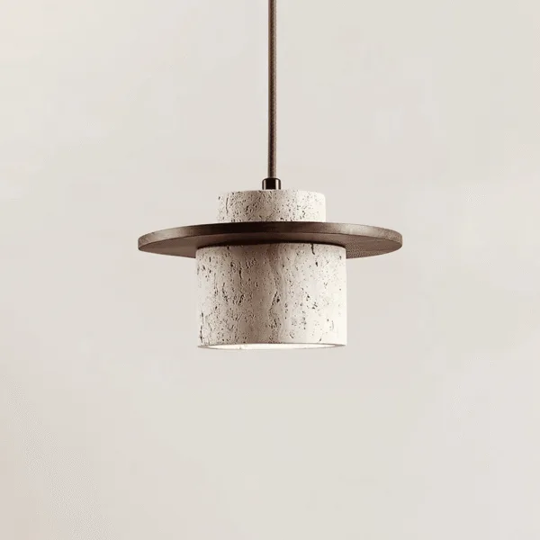Unlit travertine pendant light: cream stone cylinder, stone cap, dark wood disc and brown fabric cord