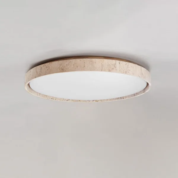 LED ceiling light with a natural travertine ring on a plain ceiling
