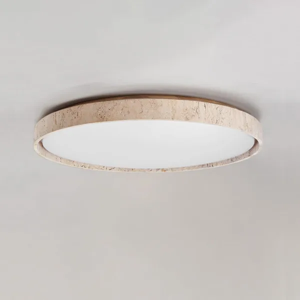 Slim travertine LED ceiling light seen at an angle