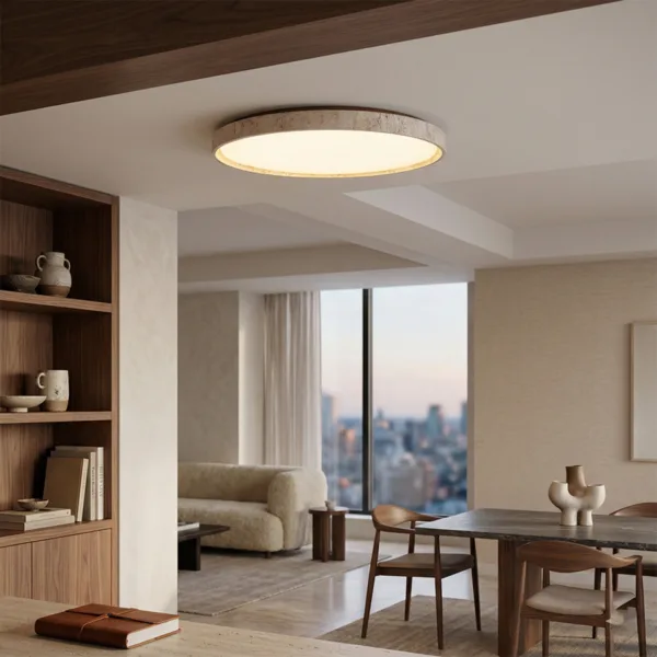 Travertine ring ceiling light in an open-plan living and dining room