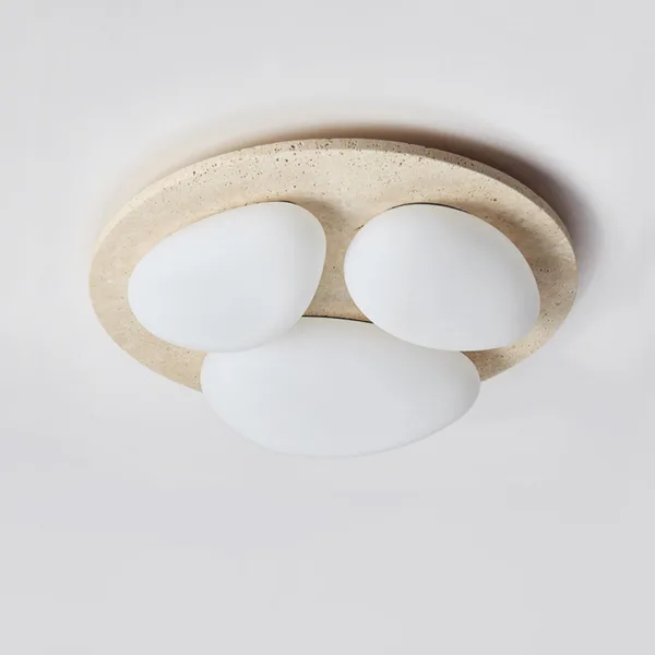 Unlit travertine ceiling light with three white pebble diffusers