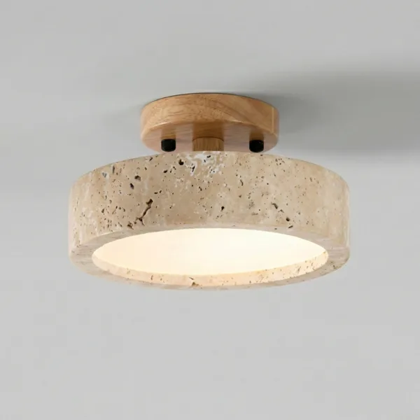 Travertine semi flush ceiling light glowing on a white ceiling