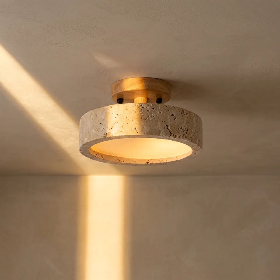 Home 2 Semi flush mount ceiling light with travertine ring and oak wood canopy in sunlight