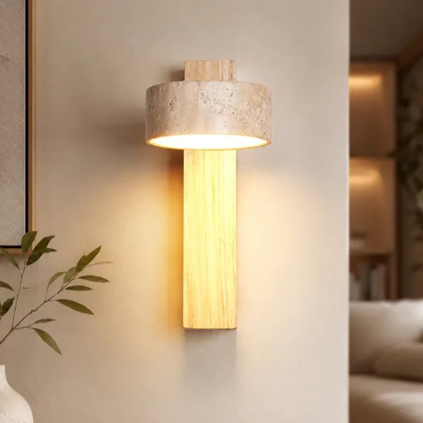 Travertine and light oak wall mounted reading light for bedroom glowing warm beside a sofa