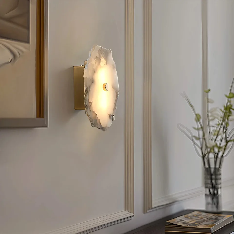 Unique Wall Light in Natural Alabaster – Raw-Edge Stone Slab Sconce, 20 cm 3 Side view of the unique alabaster wall light on its brass-finish backplate beside a panelled wall